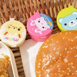 4 pieces of bento box sauce/condiment holders - nwt